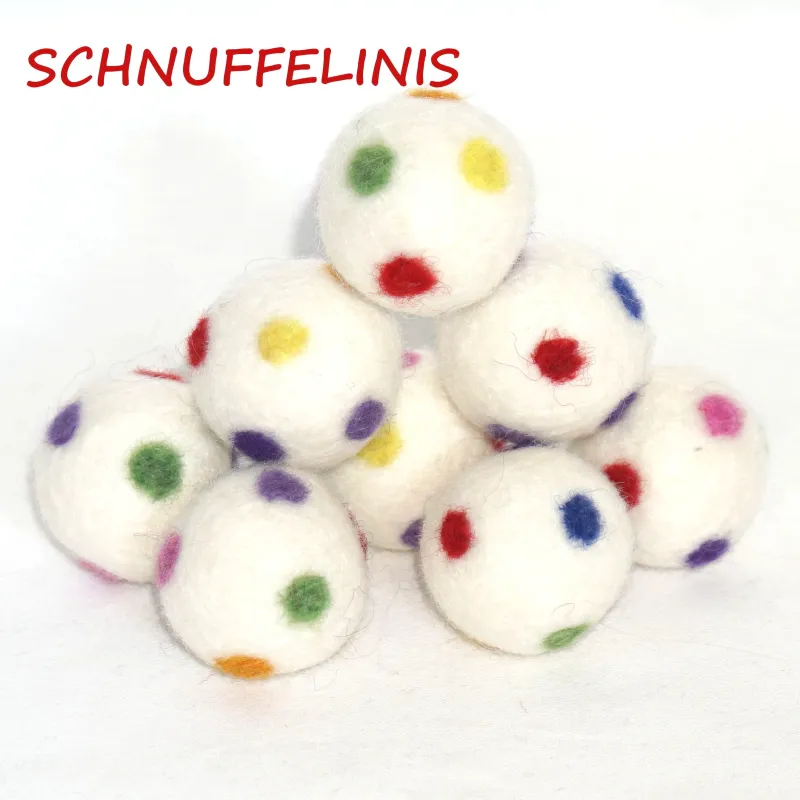 Swirly felt balls, felt balls, polka dotted felt balls, Montessori