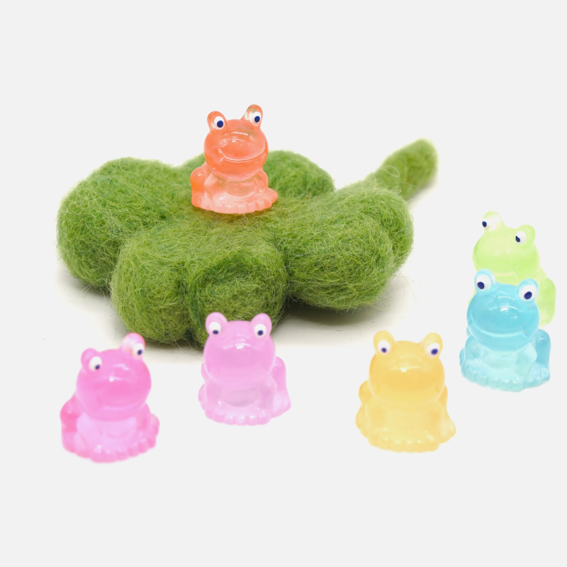 Miniature frog orange luminous