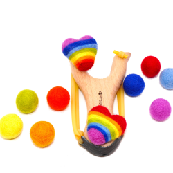 Wooden slingshot rainbow felt balls set