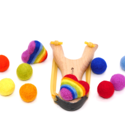 Wooden slingshot rainbow felt balls set