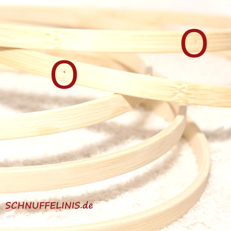 Mobile hoop with 4 holes