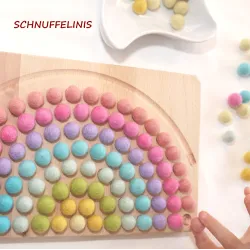 Montessori Rainbow soft, felt balls with a rainbow board