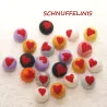 felt balls, felted balls with red hearts, flower power, XOXO
