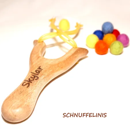 Wooden slingshot with felt balls, felt balls slingshot